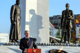 Russia Unity Day Russian President Vladimir Putin delivers his speech at the memorial complex dedicated to the end of the Russian Civil War during marking Unity Day in Sevastopol, Crimea, Thursday, Nov. 4, 2021.