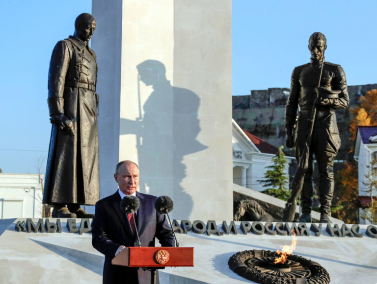 Russia Unity Day Russian President Vladimir Putin delivers his speech at the memorial complex dedicated to the end of the Russian Civil War during marking Unity Day in Sevastopol, Crimea, Thursday, Nov. 4, 2021.