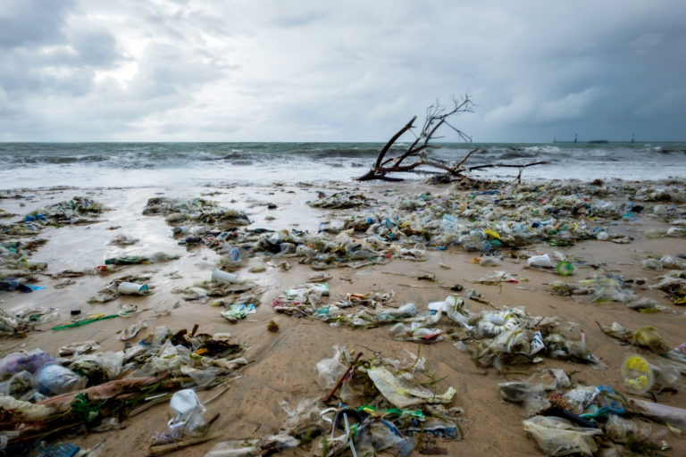 Garbage on beach, environmental pollution in Bali Indonesia.