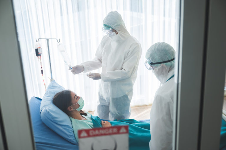 Coronavirus COVID 19 virus patient having fever, epidemic, doctor and nurse in uniform working medicine care at hospital to protection prevention and vaccination quarantine technology