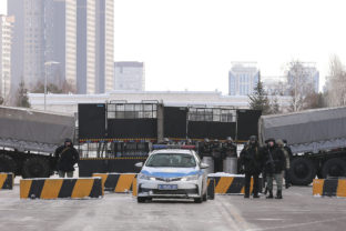 Kazakhstan Protests Police block the road towards the center of Nur Sultan, Kazakhstan, Thursday, Jan. 6, 2022. Kazakhstan's president authorized security forces on Friday to shoot to kill those participating in unrest, opening the door for a dramatic escalation in a crackdown on anti government protests that have turned violent. The Central Asian nation this week experienced its worst street protests since gaining independence from the Soviet Union three decades ago, and dozens have been killed in the tumult.