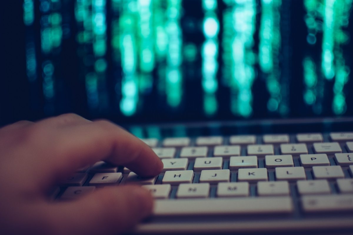 Close Up Of Hand Using Laptop