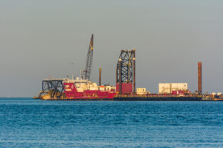 Offshore petroleum platform operated by American company at the sea of Dammam, Saudi Arabia