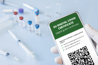 A smartphone with a qr code in the app to confirm vaccination or a negative test for covid 19