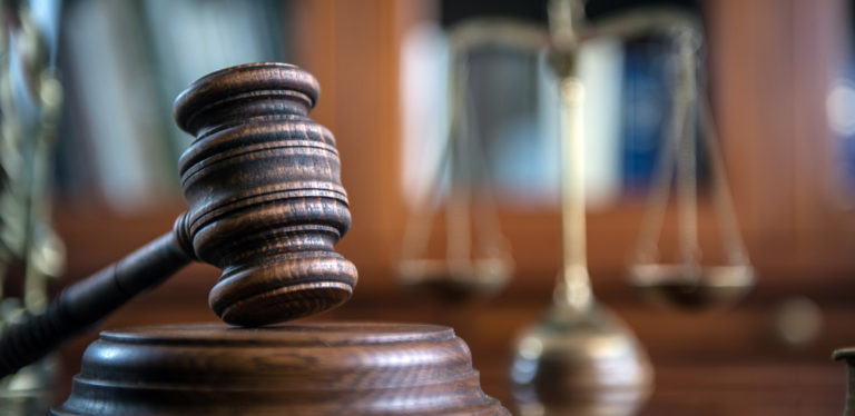 Law and Justice concept. Mallet of the judge, books, scales of justice.