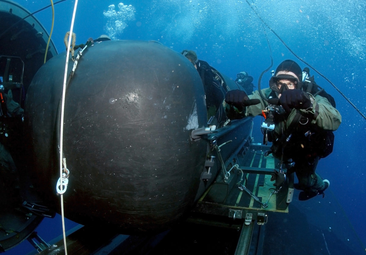 Atlantic Ocean, May 5, 2005 - A member of the SEAL Delivery Vehicle Team prepares to launch one of the team's SEAL Delivery Vehicles (SDV) from the back of the Los Angeles class attack submarine USS Philadelphia (SSN 690) on a training exercise.