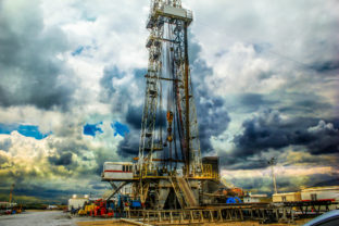 Drilling on the geothermal well platform and Equipments on a cloudy day