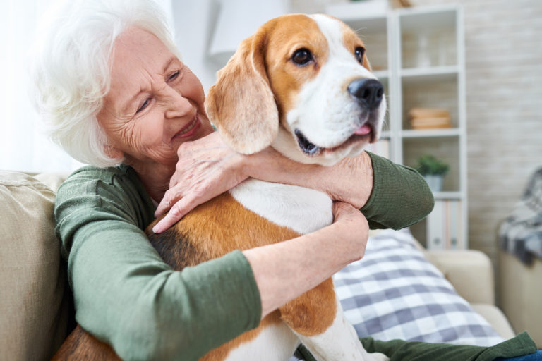 Happy granny loving her dog