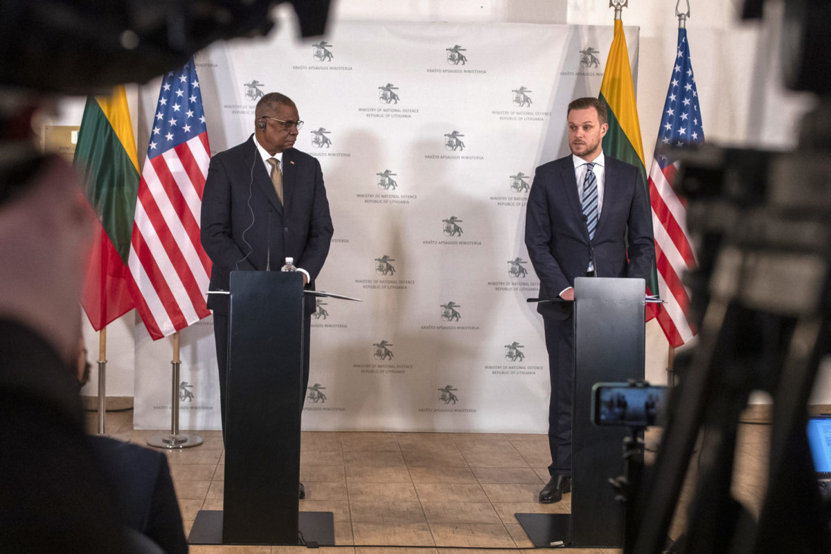 Lithuania US U.S. Secretary for Defense Lloyd J. Austin III, left, speaks during a media conference with Lithuania's Minister of Foreign Affairs Gabrielius Landsbergis, acting as Minister of National Defense, at the Defense Ministry in Vilniusat the Defense Ministry in Vilnius, Lithuania, Saturday, Feb. 19, 2022. Austin is meeting with Lithuanian officials including President Nauseda, Prime Minister Ingrida Simonyte and Foreign Minister Gabrielius Landsbergis, as acting Minister of National Defense. Ukraine Tensions