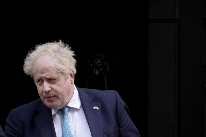 APTOPIX Britain Politics British Prime Minister Boris Johnson leaves 10 Downing Street to attend the weekly Prime Minister's Questions at the Houses of Parliament, in London