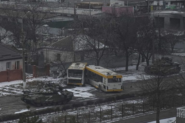 Russia Ukraine War Russian's army tanks move down a street on the outskirts of Mariupol, Ukraine