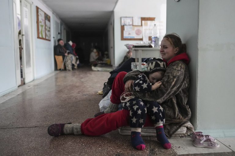 Russia Ukraine War Anastasia Erashova cries as she hugs her child in a corridor of a hospital in Mariupol, eastern Ukraine on Friday, March 11, 2022. Anastasia's other child was killed during the shelling of Mariupol