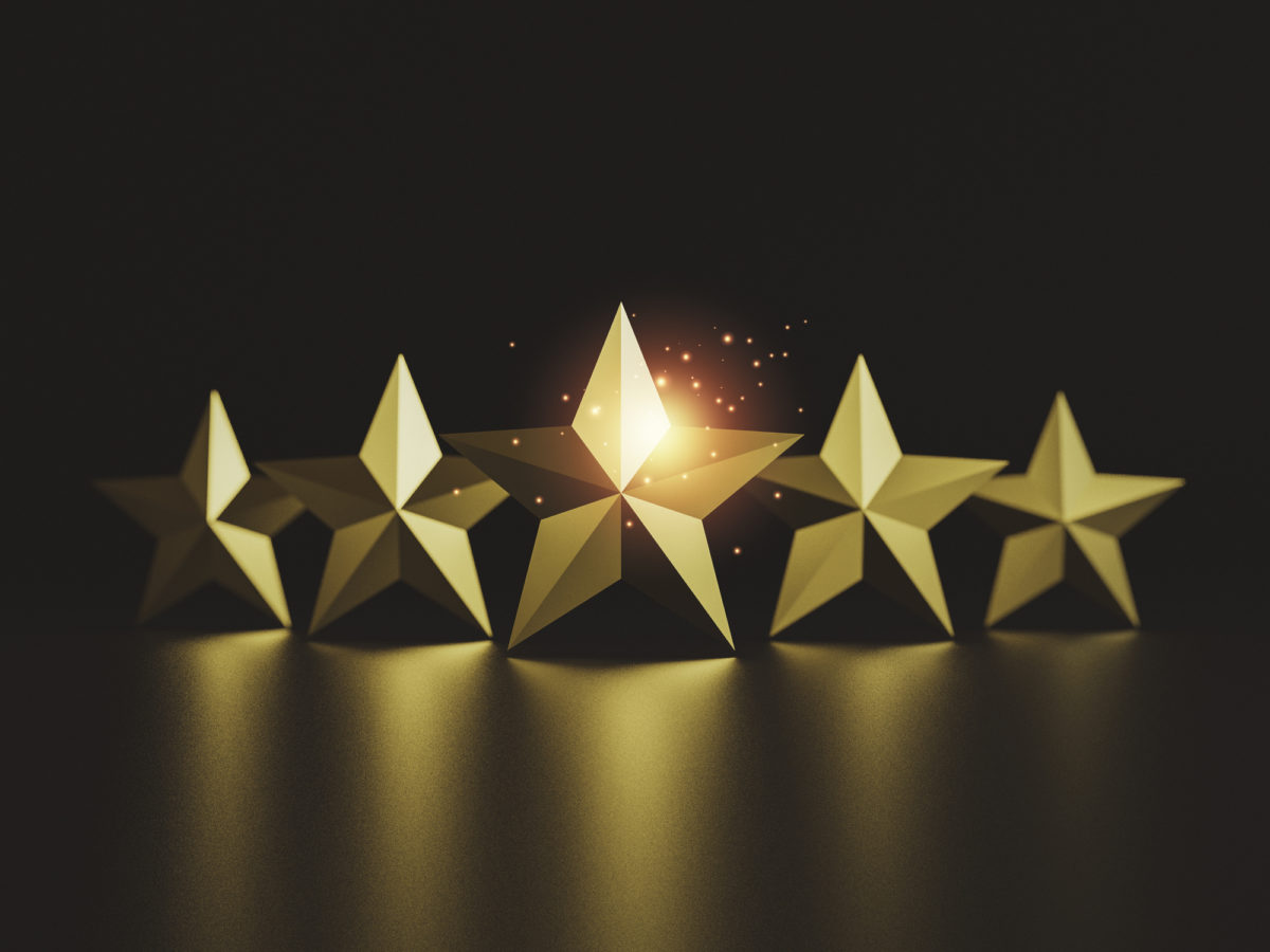 Gold five star on dark background for excellent rate of customer evaluation by 3d render.