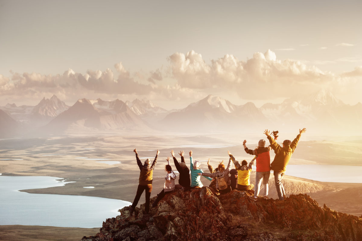 Big group of people success mountain top