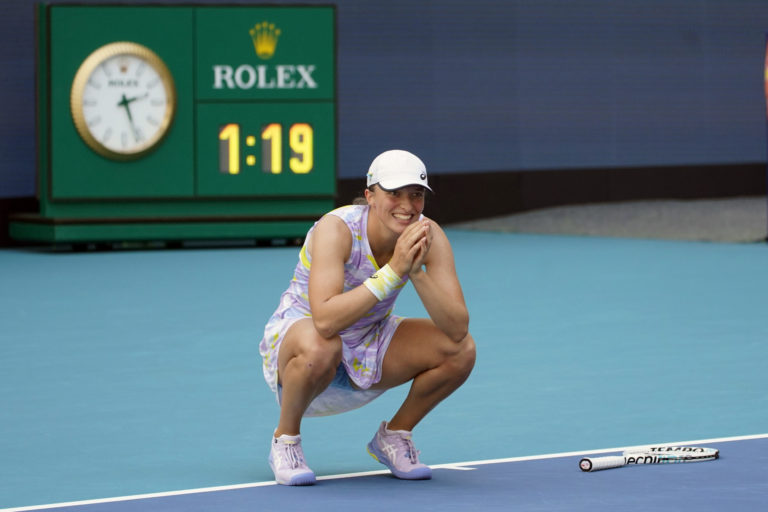 Iga Swiatek Iga Swiatek of Poland, reacts after beating Naomi Osaka of Japan, 6 4, 6 0, during the women's singles finals of the Miami Open tennis tournament, Saturday, April 2, 2022, in Miami Gardens