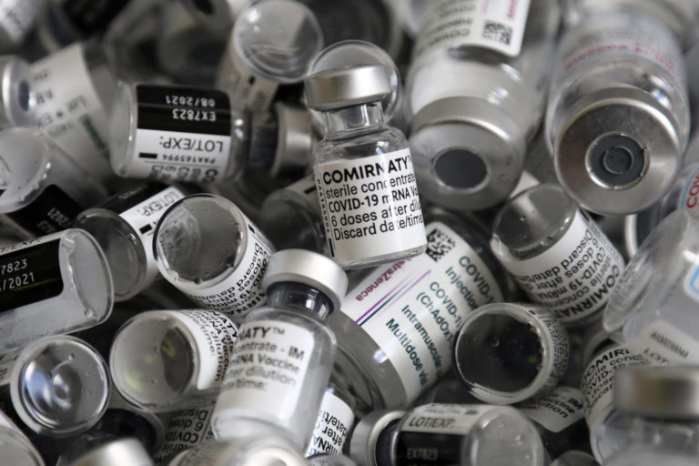 Virus Outbreak Germany FILE - In this file photo dated Saturday, May 15, 2021, empty vials of the Pfizer BioNTech COVID 19 vaccine lie in a box during a vaccine campaign at the Vaccine Village in Ebersberg near Munich, Germany. Germany's health ministry said Monday that the country may have to discard 3 million doses of expired COVID 19 vaccine