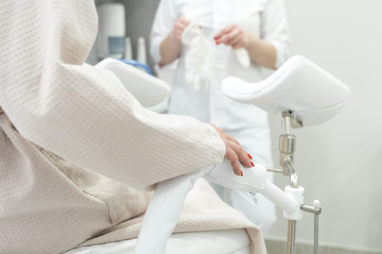 Patient with a gynecologist during the consultation in the gynecological office