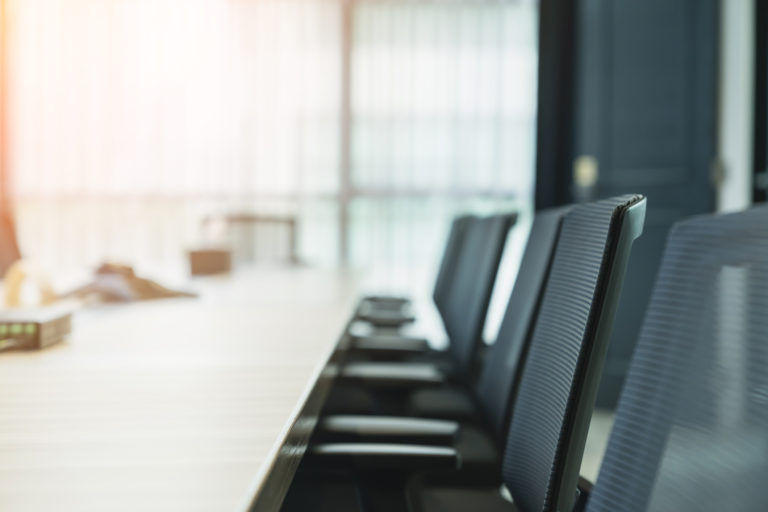 Close up modern design chair in conference room with window curtain background free copy space for your creativity ideas text