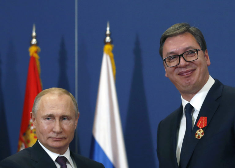 FILE- Russian President Vladimir Putin, left, poses with Serbian President Aleksandar Vucic after being awarded the Order of Alexander Nevsky in Belgrade, Serbia, Thursday, Jan. 17, 2019. Vucic said he has secured an "extremely favorable" gas deal with Russia during his telephone conversation with Vladimir Putin on Sunday, May 29, 2022. The Serbian populist president has announced that he has secured an “extremely favorable” gas deal with Russia. Serbian President Aleksandar Vucic, a former pro-Russian ultranationalist who claims he wants to take Serbia into the European Union, has refused to publicly condemn Russia's invasion of Ukraine. ()