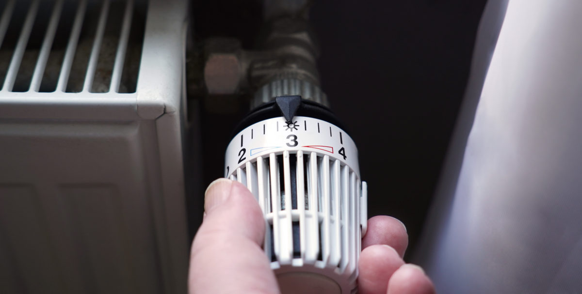 Turning down thermostat on radiator to save energy due to heating cost price hike