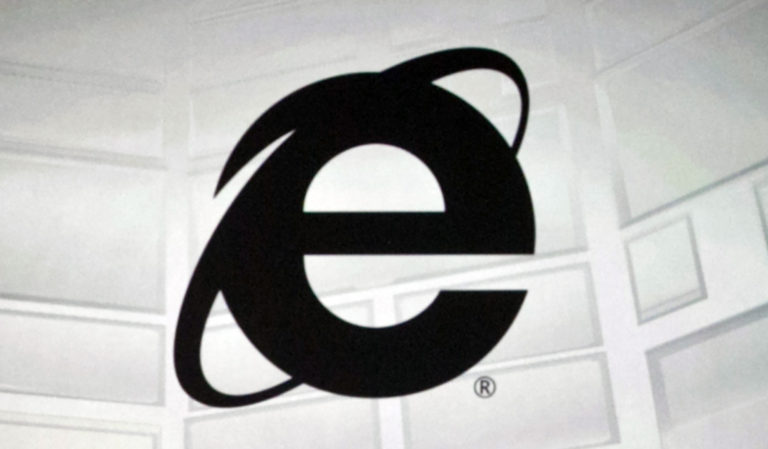 FILE - The Microsoft Internet Explorer logo is projected on a screen during a Microsoft Xbox E3 media briefing in Los Angeles, June 4, 2012. As of Wednesday, June 15, 2022, Microsoft will no longer support the once-dominant browser that legions of web surfers loved to hate and a few still claim to adore. ()