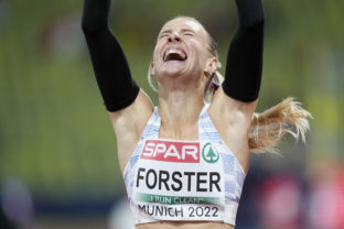 Viktoria Forster, of Slovakia, reacts after winning the silver medal in a Women's 100 meters hurdles heat during the athletics competition in the Olympic Stadium at the European Championships in Munich, Germany