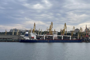 In this photo provided by the Ukrainian Infrastructure Ministry Press Office, the Razoni cargo ship, under the flag of Sierra Leone, with 26,000 tons of the Ukrainian corn aboard, leaves the port in Odesa region, Ukraine, Monday, Aug. 1, 2022. The first ship carrying Ukrainian grain set off from the port of Odesa on Monday under an internationally brokered deal and is expected to reach Istanbul on Tuesday, where it will be inspected, before being allowed to proceed