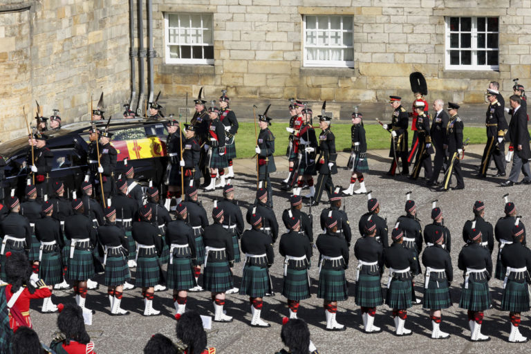 King Charles III, the Princess Royal, the Duke of York and the Earl of Wessex walk behind the hearse carrying the coffin of Britain's Queen Elizabeth II, in Edinburgh, Scotland, Monday Sept. 12, 2022. King Charles III will accompany the queen coffin on a solemn procession through the cobbled streets of the Scottish capital from the royal Palace of Holyroodhouse to St. Giles' Cathedral, where members of the public will be able to pay their respects