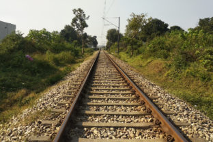 A railway Track passing from rural areas in India
