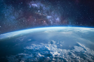 Earth planet surface in outer space. Stars and milky way on background. Sci fi space wallpaper. Elements of this image furnished by NASA