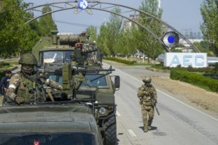 FILE - A Russian military convoy is seen on the road toward the Zaporizhzhia Nuclear Power Station, in Enerhodar, Zaporizhzhia region, in territory under Russian military control, southeastern Ukraine, on May 1, 2022. Russia has devised yet another way to spread disinformation about its invasion of Ukraine, using digital tricks that allow its war propaganda videos to evade restrictions imposed by governments and tech companies. ()