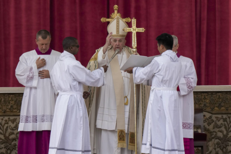 Pope Francis delivers his blessing as he celebrates a mass for the canonization of two new saints, Giovanni Battista Scalabrini and Artemide Zatti, in St. Peter's Square at the Vatican