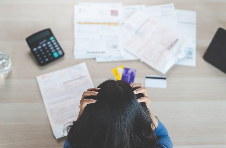 Top,View,Of,Stressed,Young,Asian,Woman,Trying,To,Find