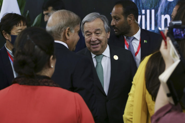 U.N. Secretary-General Antonio Guterres, center, speaks with Prime Minister of Pakistan Muhammad Shehbaz Sharif, center left, after a joint news conference at the COP27 U.N. Climate Summit, Monday, Nov. 7, 2022, in Sharm el-Sheikh, Egypt