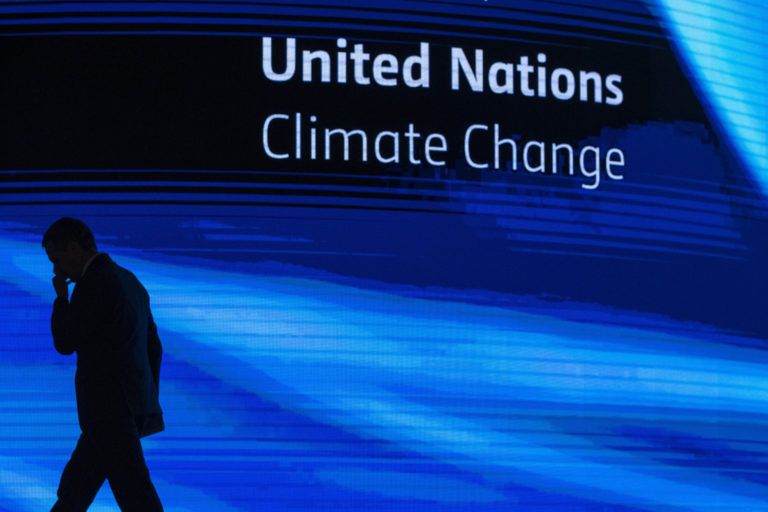 Ignazio Cassis, president of Switzerland, leaves after speaking at the COP27 U.N. Climate Summit, Monday, Nov. 7, 2022, in Sharm el-Sheikh, Egypt