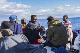 Migrants on the deck of the Rise Above rescue ship run by the German organization Mission Lifeline, in the Mediterranean Sea off the coasts of Sicily, southern Italy, Sunday, Nov. 6, 2022. Italy allowed one rescue ship, the German run Humanity 1, to enter the Sicilian port and begin disembarking minors, but refused to respond to requests for safe harbor from three other ships carrying 900 more people in nearby waters