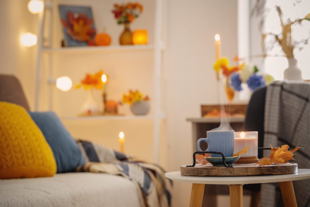 Cup,Of,Coffee,In,Cozy,Interior,With,Autumnal,Decor