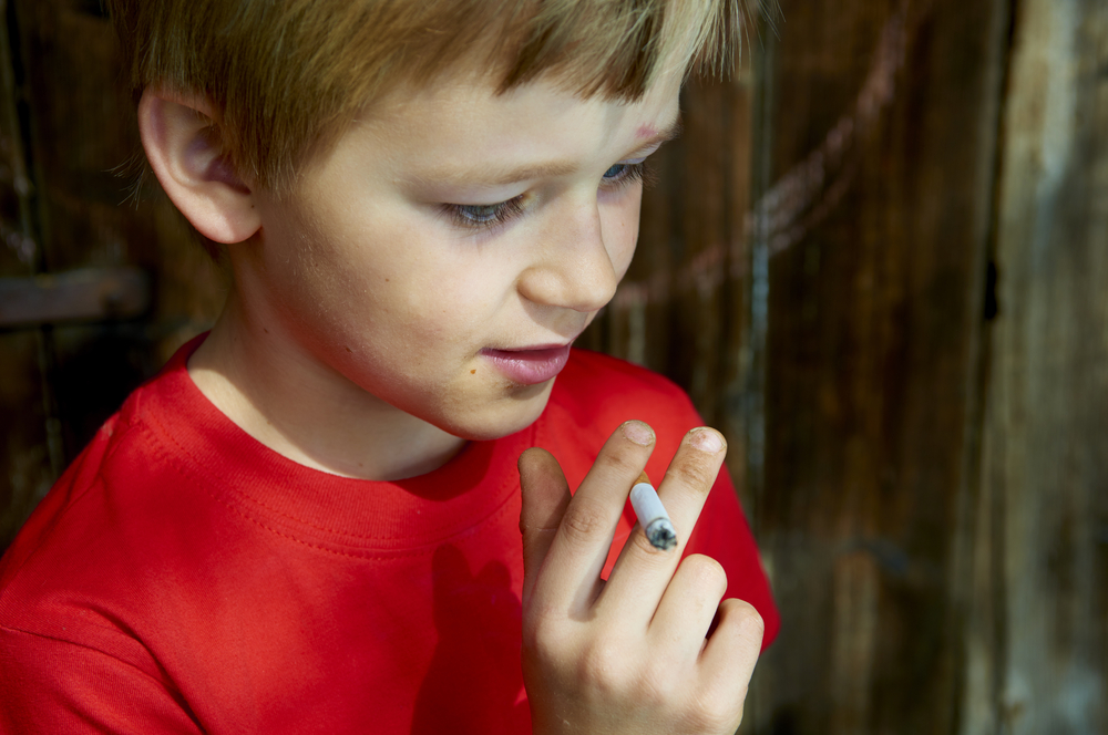 Portrait,Of,Child,Young,Schooler,Boy,Smoking,The,Cigarette,On