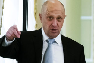 FILE - businessman Yevgeny Prigozhin gestures on the sidelines of a summit meeting between Russian President Vladimir Putin and Turkish President Recep Tayyip Erdogan at the Konstantin palace outside St. Petersburg, Russia, on Tuesday, Aug. 9, 2016. Prigozhin, an entrepreneur known as "Putin's chef" because of his catering contracts with the Kremlin, has admitted he interfered in U.S. elections and says he will continue to do so — for the first time confirming the accusations he has been rejecting for years. "We have interfered, are interfering and will continue to interfere