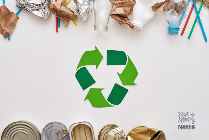 Save the world. Canned garbage, sorted separately near recycle symbol
