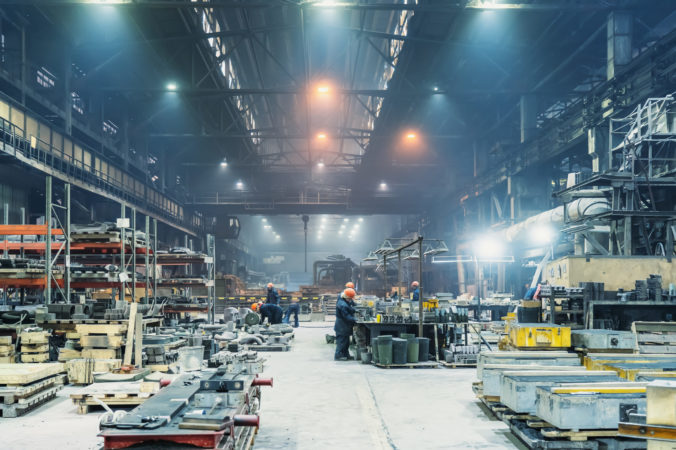 Interior of metalworking factory workshop hangar. Modern industrial enterprise production