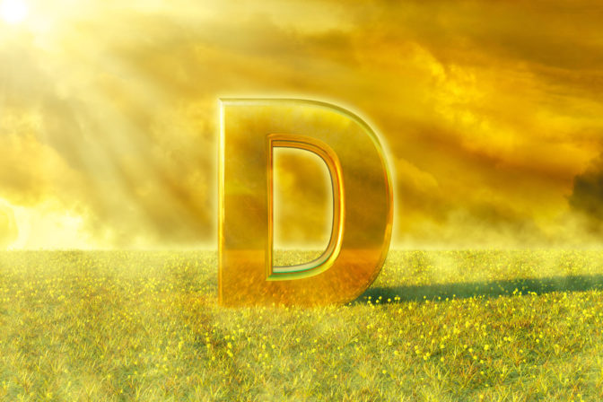 Vitamin D illuminated by the rays of the sun on grass. Sunlight is an excellent source of this nutrient that strengthens the immune system