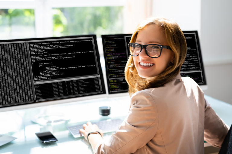 Programmer Woman Coding On Computer