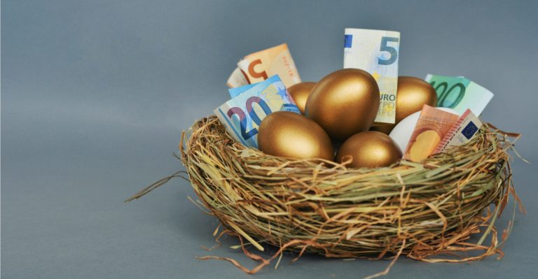 Golden,Eggs,In,A,Nest,With,Cash,Euro,Banknotes,On