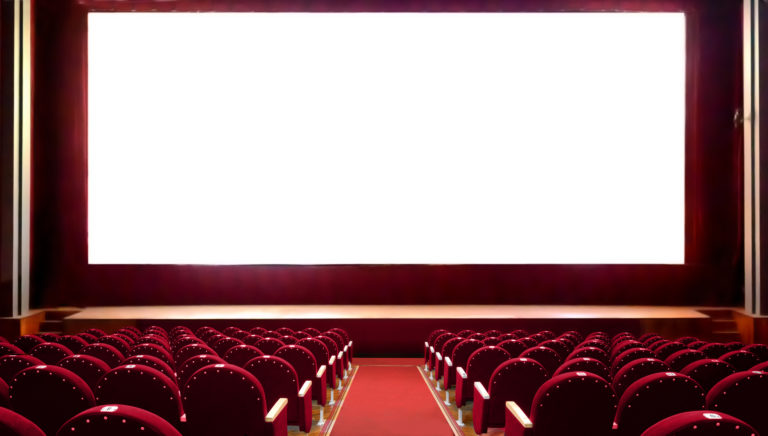 Empty red cinema seats with blank white screen for adding a picture