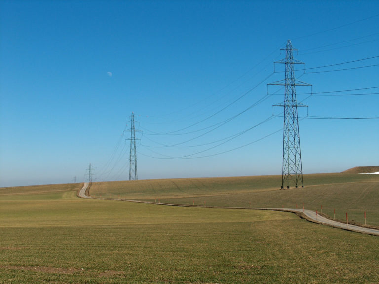 Pylons under blue sky