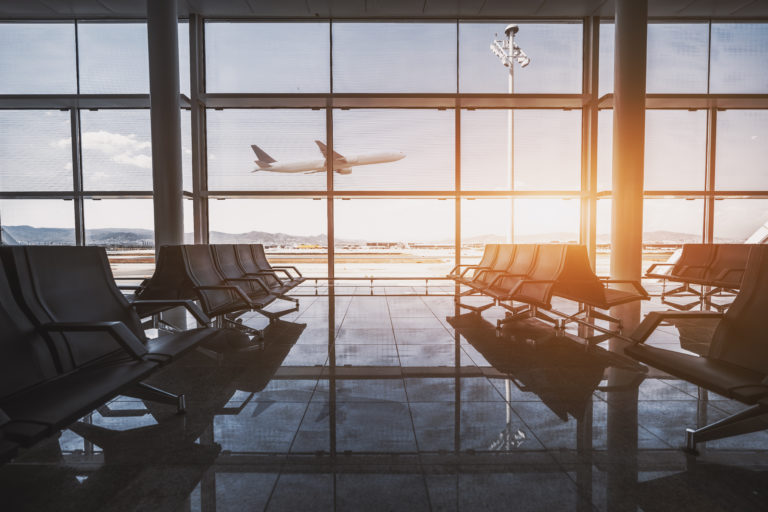 Airport waiting room, flying plane
