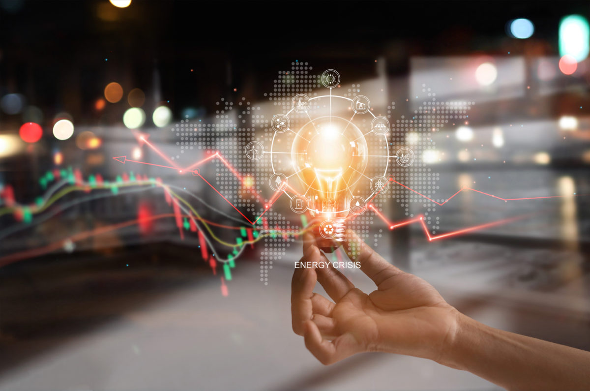 Energy crisis, Hand hold light bulb with energy resources icon and rising data chart representing electricity crisis, Economy and alternative energy, Sustainability. Ecological friendly.