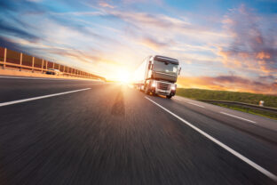 European truck vehicle with dramatic sunset light