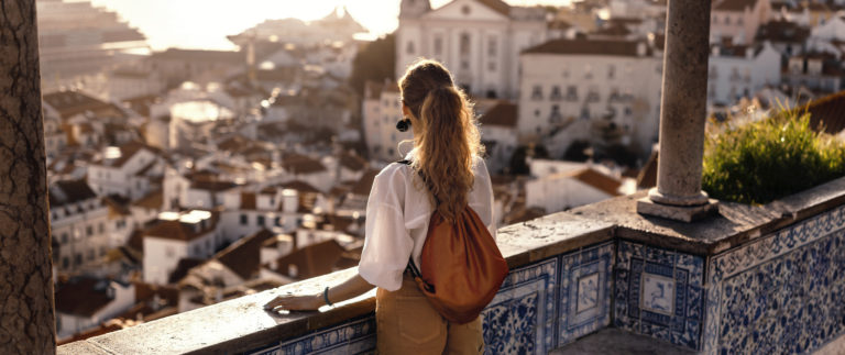Young women exploring streets of southern Iberic european city